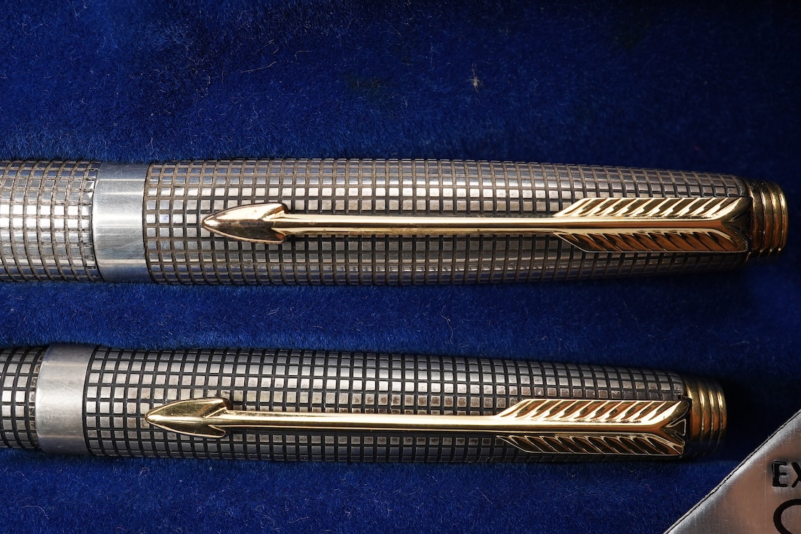 A Parker Sterling silver Cisele fountain pen and matching ballpen in original box along with a collector's pen case